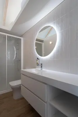 a white bathroom with a sink and a mirror at FONTE SANTA Manor House in Vila Nova de Gaia