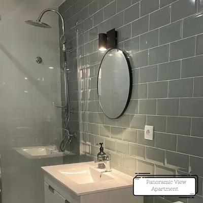 a bathroom with a sink and a mirror at Manuel Apartment - Porto Velho Apt in Porto