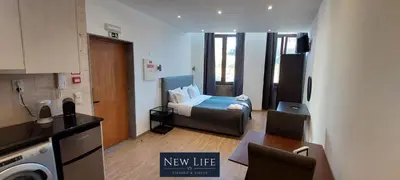 a new life apartment with a bed and a kitchen at New Life - FUNDAÇÃO SERRALVES STUDIO-0F in Porto