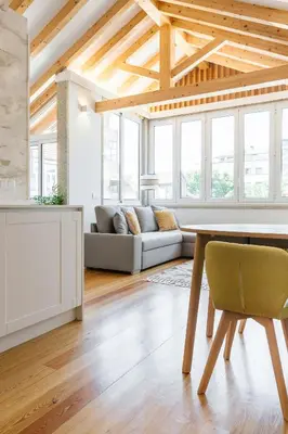 a living room with a table and a couch at ORM Prado Apartment in Porto