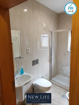 a new life bathroom with a toilet and a shower at New Life - SÉ CATEDRAL STUDIO - 1T in Porto