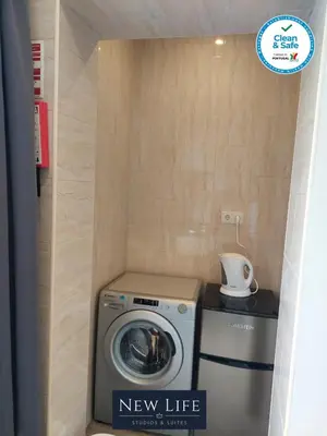 a new life laundry room with a washer and dryer at New Life - SÉ CATEDRAL STUDIO - 1T in Porto