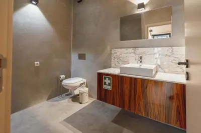 a shower with a glass door in a bathroom at City Center Premium Apartment by Vacationy in Porto