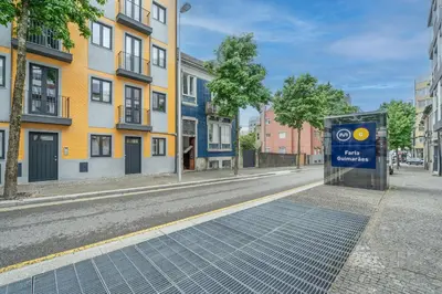 a sign on the side of a city street at Paraíso Apartment by Amber Star Rent in Porto