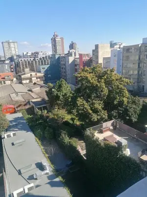 an overhead view of a city with buildings and trees at Hey Porto Apartment in Porto