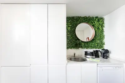 a bathroom with a sink and a mirror at Cozy House w/ AC near metro by LovelyStay in Porto