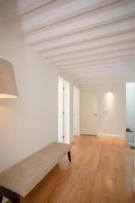 an empty room with a bench in the middle of it at Liiiving in Gaia - Douro Dream View in Vila Nova de Gaia