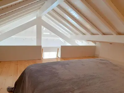 a bedroom with a bed in a attic at Porto Vista by Flat in Porto in Porto