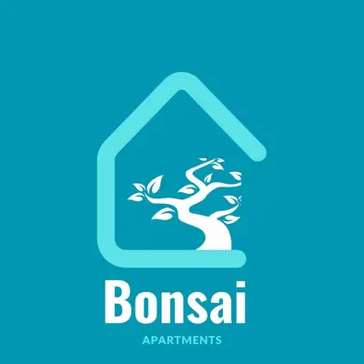 a tree in a house logo at Bonsai Apartment III in Porto