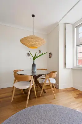 a dining room with a table and chairs at BOUTIQUE Rentals- DOURO Ribeira historical center with parking in Porto