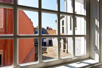 a view from a window of a city street at BOUTIQUE Rentals- DOURO Ribeira historical center with parking in Porto