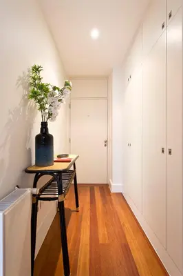 a room with a table with a plant on it at BOUTIQUE Rentals- DOURO Ribeira historical center with parking in Porto
