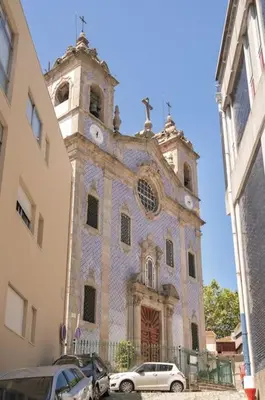 a church with a car parked in front of it at Away to Discover Apartment - hapiness has a place in Porto