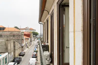 a view of a city street from a window of a building at Bright Studio near Douro River - with Balcony in Porto