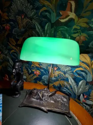 a green lamp sitting on top of a table at Cozy Central 3 Bedrooms Bragas in Porto