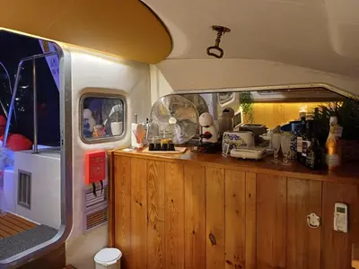 a kitchen in an rv with a wooden counter at SLEEPBOAT LuxLife Yatch in Porto