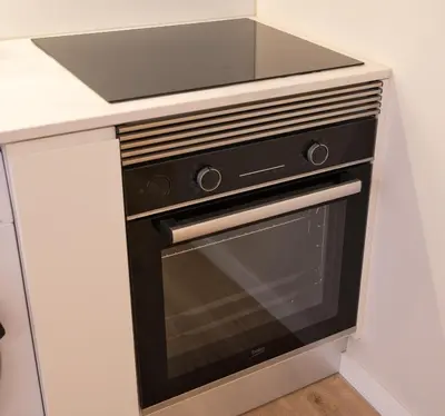 a kitchen oven with a sink on top of it at Cactus Apartment, by Bolhão Residences in Porto
