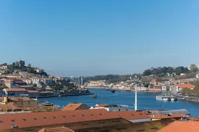a view of a river with buildings and a city at Dream Views of Porto - Private Apt in Gaia by Lisbeyond in Vila Nova de Gaia