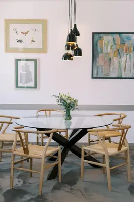 a dining room with a white table and chairs at The Editory Artist Baixa Porto Hotel in Porto