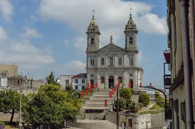 an old building with stairs leading up to it at OPORTO GUEST Bonfim Apartment in Porto