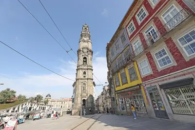 a tall clock tower in the middle of a city at FLH Porto Clérigos Luxury Apartments in Porto