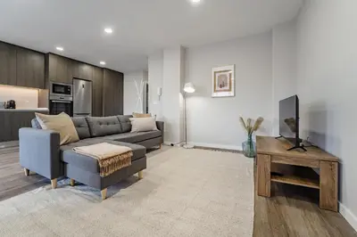 a living room with a couch and a table at Nomad's Family - 2BED Casa da Música in Porto