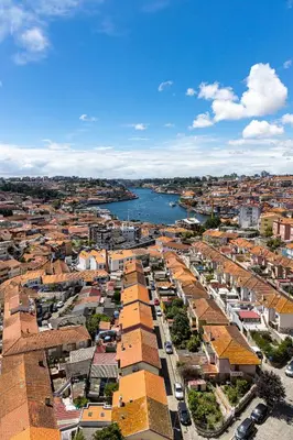 an aerial view of a city with a river and buildings at River 9 and City View Porto Gaia by MP in Vila Nova de Gaia