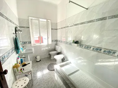 a bathroom with a shower and a toilet and a sink at BREINER 28 in Porto