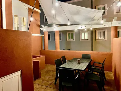 a patio with a table and chairs on a balcony at BREINER 28 in Porto
