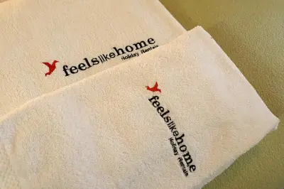 a white napkin with the name of a restaurant on it at FLH Porto Santa Catarina Cosy Flat in Porto