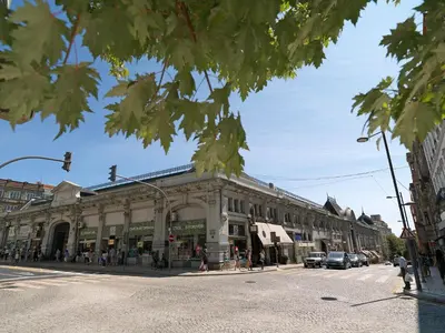 a building on the corner of a city street at FLH Porto Santa Catarina Cosy Flat in Porto