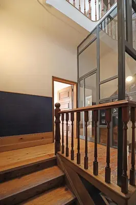 a staircase in a house with a glass wall at FLH Porto Classic Apartment with Terrace & Parking in Porto