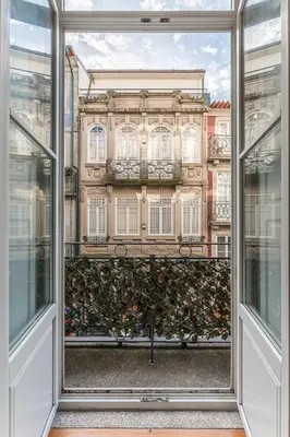 a view of a building from an open window at GuestReady - Amazing Studio in the heart of Porto in Porto