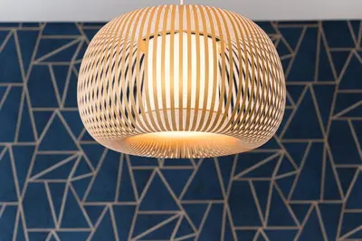 a large light fixture hanging from a ceiling at GuestReady - Amazing Studio in the heart of Porto in Porto