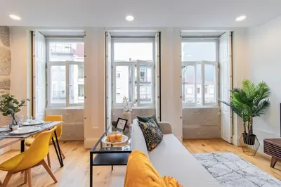 a living room with a couch and a table at Rodrigues de Freitas 391 by LovelyStay in Porto