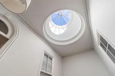 a ceiling with a round window in a room at Music Shell by LovelyStay in Porto