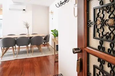 a dining room with a table and chairs at Feel Porto Classic Apartment in Porto