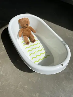 a teddy bear sitting in a white bowl at LovePorto2 Balcony/Garden@Hist.C in Porto