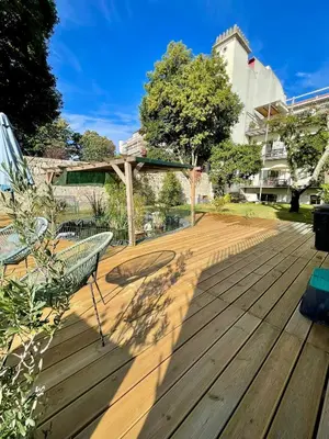 a wooden deck with a bench on top of it at LovePorto2 Balcony/Garden@Hist.C in Porto