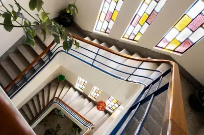 an overhead view of a staircase with stained glass windows at Fradelos Porto Centro in Porto