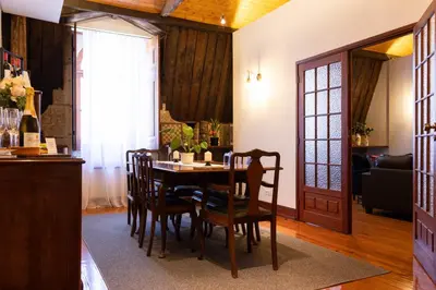 a dining room with a table and chairs at Fradelos Porto Centro in Porto