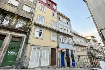 a row of buildings on a city street at Caldeireiros Lovely Suite by Porto City Hosts in Porto