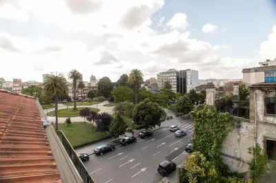 a view of a city street with cars on the road at Republica Square Apartment by Porto City Hosts in Porto
