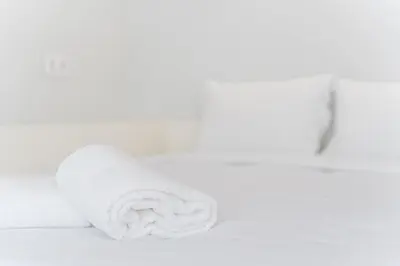 a roll of white toilet paper sitting on a table at GuestReady - San Sebastian Studios in Porto