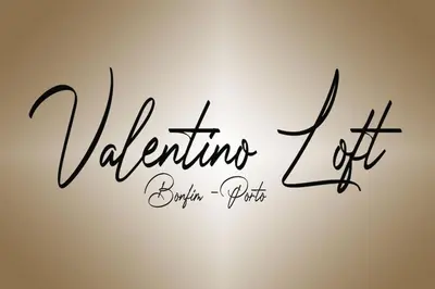 a sign that reads valentines off written in black handwriting at Valentino Loft Porto Center - by Guest SPA in Porto