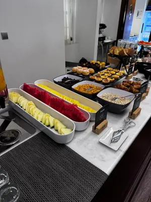 a buffet with many different types of food on a table at Oca Ribeira do Porto AT in Porto