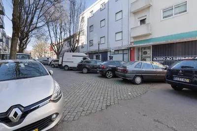 a group of cars parked in a parking lot at APOSENTUS - Serenity Terrace in Porto