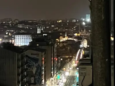 a view of a city at night with lights at Modern Room with Indoor Shower Near the River - Quarto Moderno com Duche interior Próximo da Ribeira in Vila Nova de Gaia