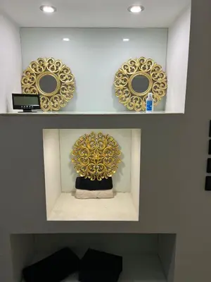 a shelf with three mirrors and a cake on it at Modern Room with Indoor Shower Near the River - Quarto Moderno com Duche interior Próximo da Ribeira in Vila Nova de Gaia