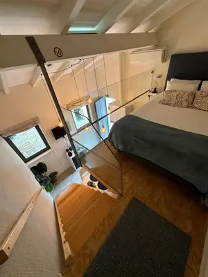 an overhead view of a bedroom with a bed at Ilhas Douro Fontaínhas by PA Hotels in Porto